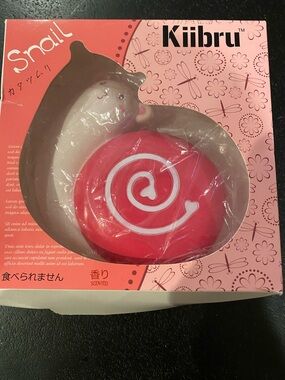 Kiibru pink snail squishy toy